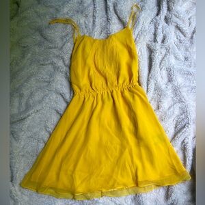 Yellow Bebe sun dress with silk slip under and chiffon overlay size XXS